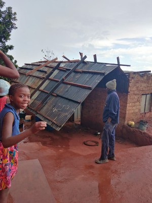 Photo of roof blown off house