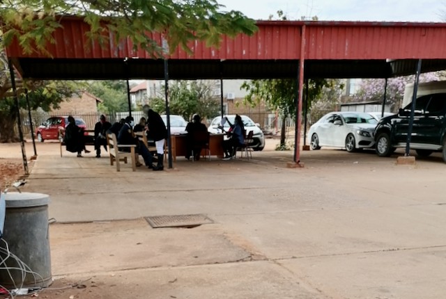 Photo of people in a car park