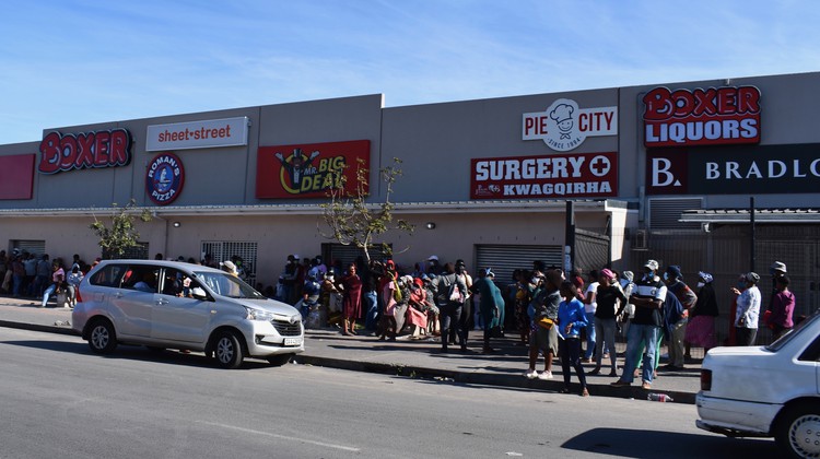 Photo of crowd outside mall