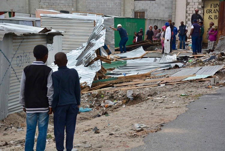 Photo of flattened shacks