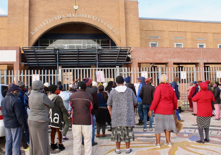 Photo of protesters outside court