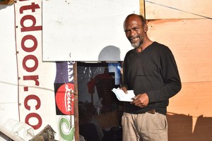 Photo of man in informal settlement in Salt River