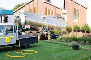 Photo of truck pumping water