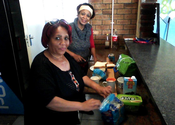 Photo of two women in a kitchen