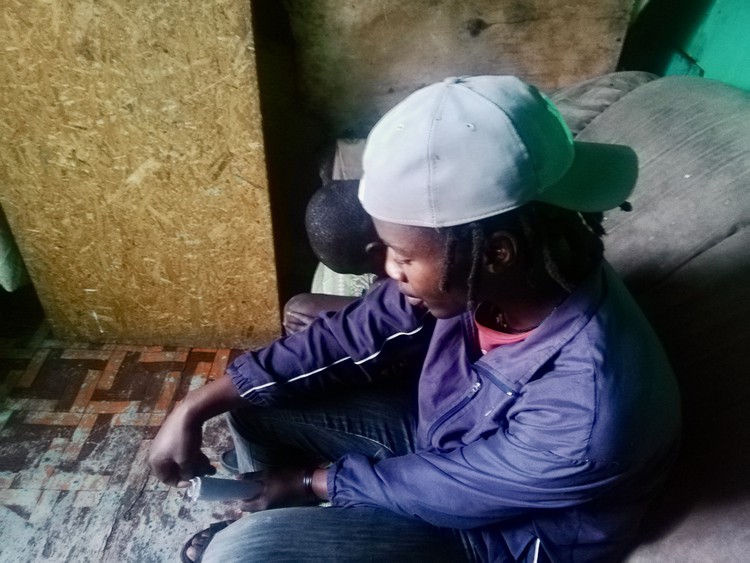 Photo of a young man sitting