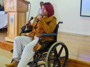 Photo of a  woman in a wheelchair