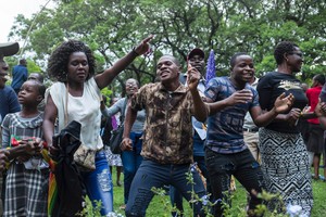 Zimbabweans celebrate call to remove Mugabe