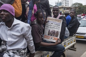 Thousands of Zimbabweansmarch for the removal of Robert Mugabe.