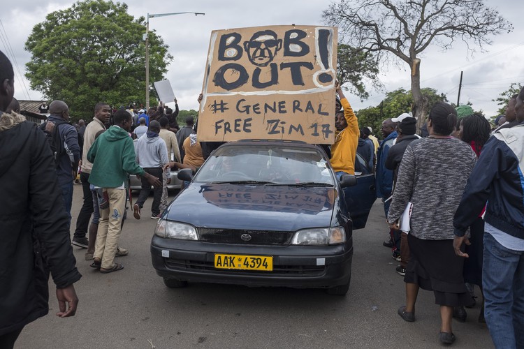 There were many signs calling for the removal of the world's oldest head of state.