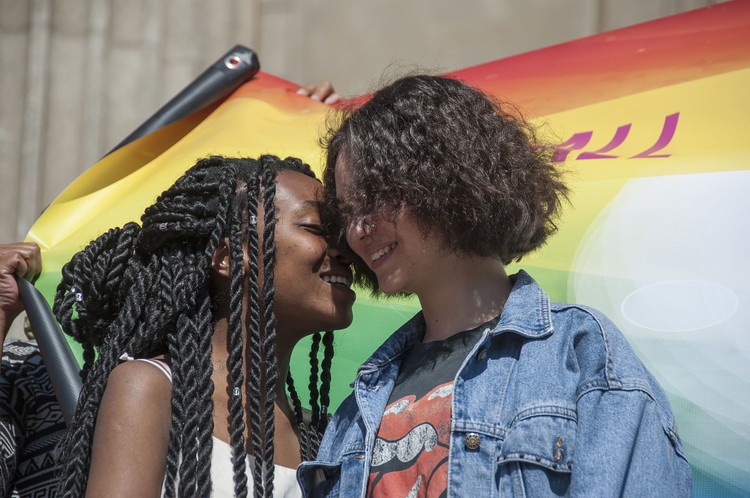 Photo of two women being affectionate