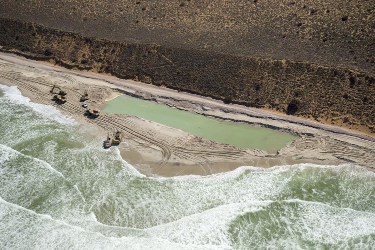 Photo of mining on beach