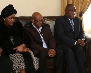 Photo of Ramaphosa with parents of Uyinene Mrwetyana