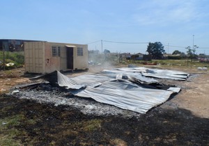 Photo of a burnt down structure