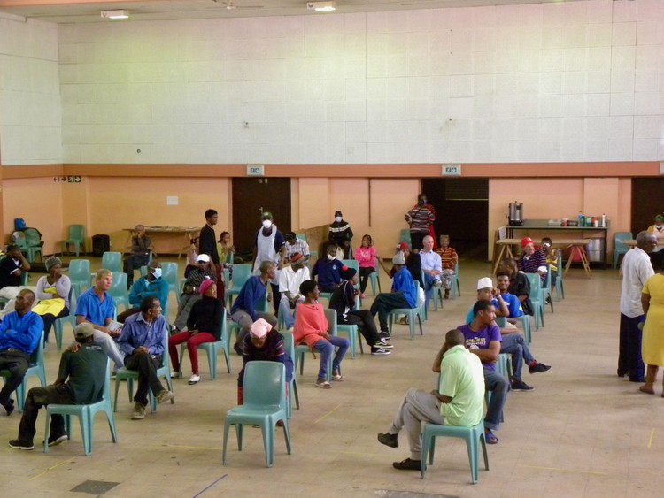 Photo of a group of people in a hall