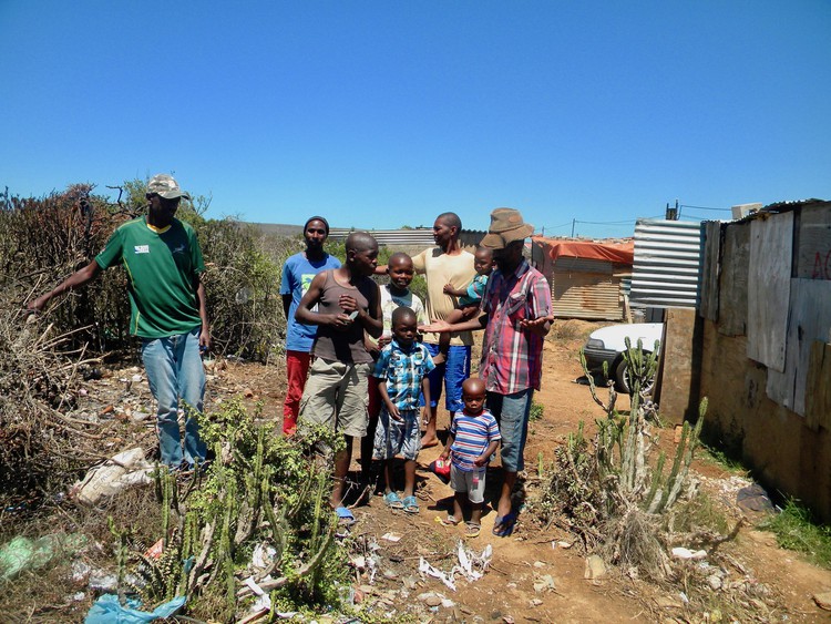 Photo of a group of people in the veld