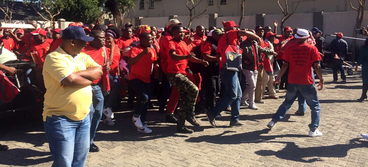 Photo of workers dancing