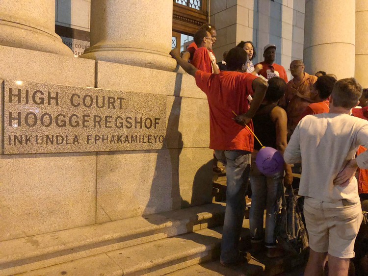 Photo of people outside court