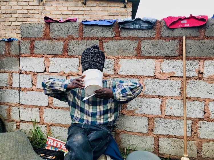 Photo of a man drinking beer