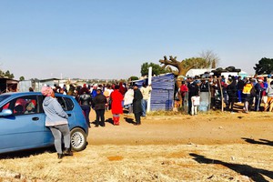 Photo of people in queue