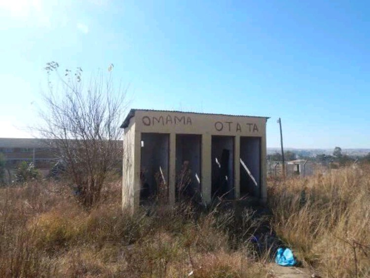 Photo of pit toilets.