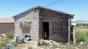 Photo of an unplastered house