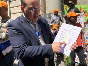 Photo of man with map