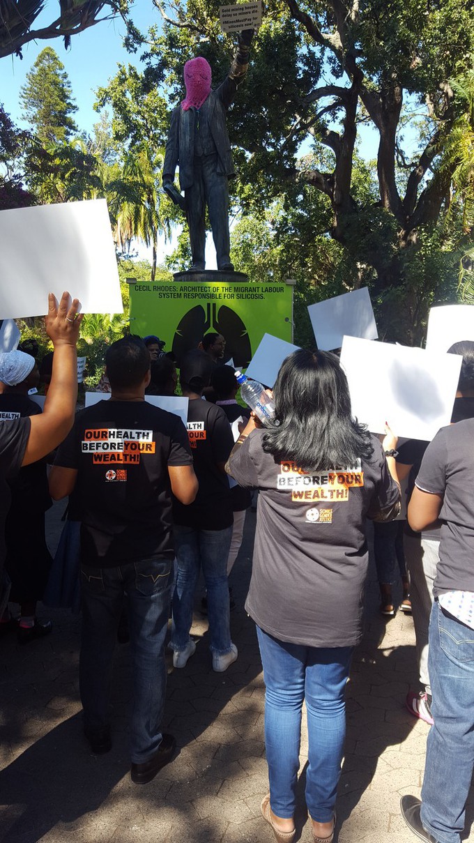 Photo of Rhodes statue during demonstration