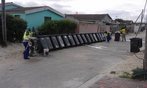 Photo of men with bins