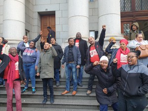 Photo of people outside court