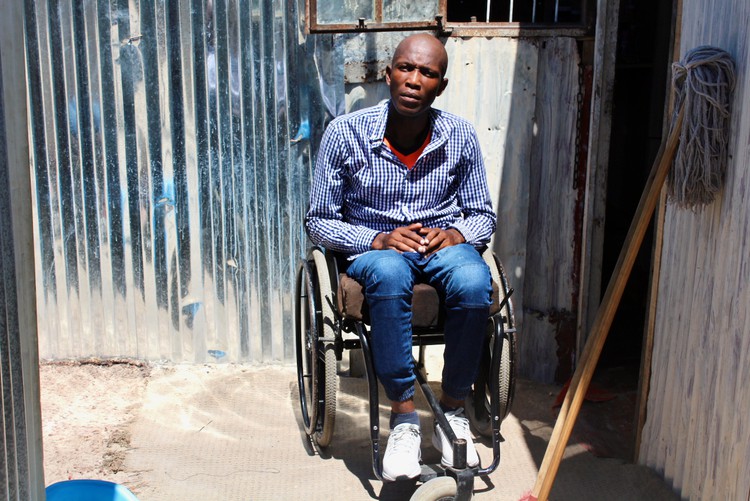 Photo of a man in a wheelchair