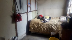 Photo of a bedroom in a shack