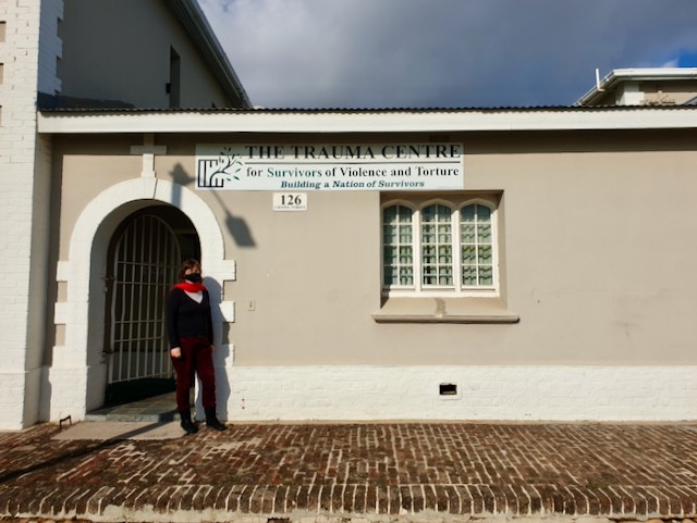 Photo of a woman in front of a building