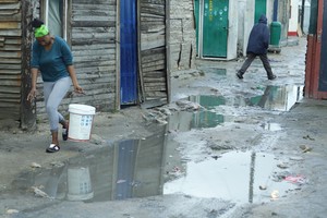 Photo of people in wet conditions