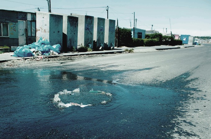 Photo of overflowing storm drain