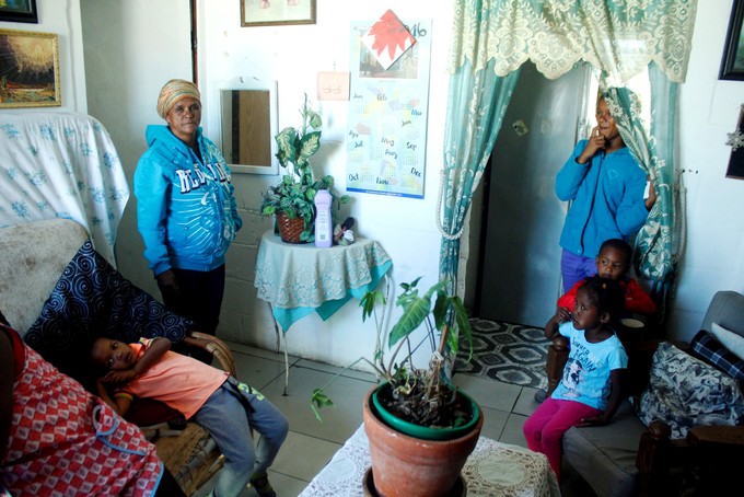 Photo of a family in their lounge