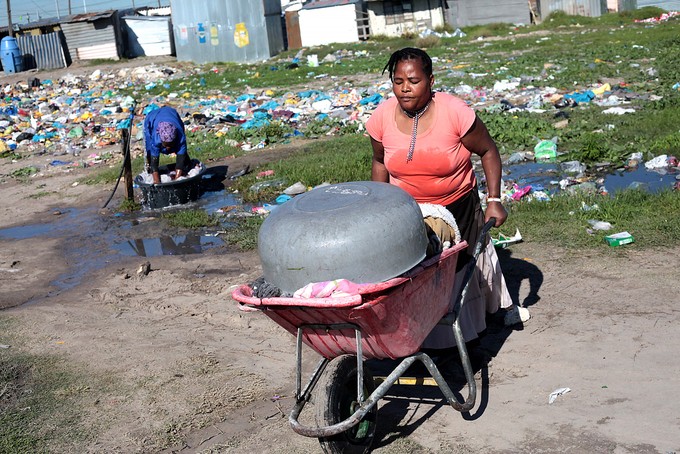 Woman with wheelbarrow