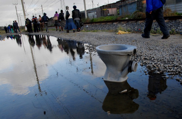 Photo of toilet in a flooded road