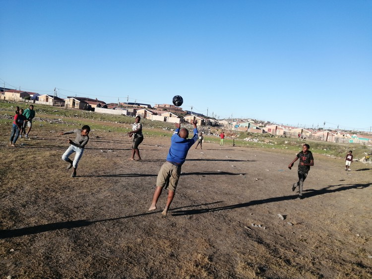 Photo of boys playing soccer