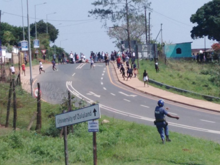 Photo of crowd with police officer