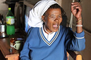 Photo of woman in shack