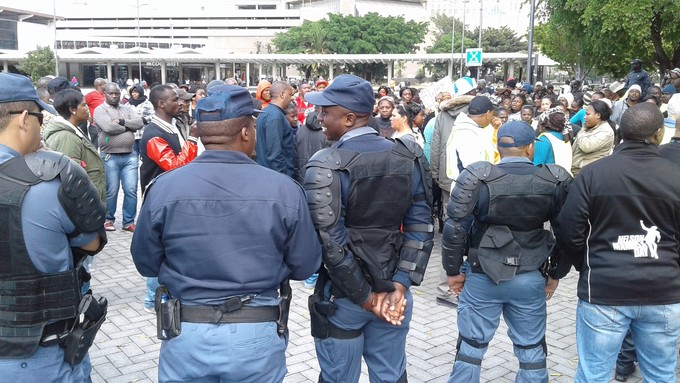 Photo of police and traders