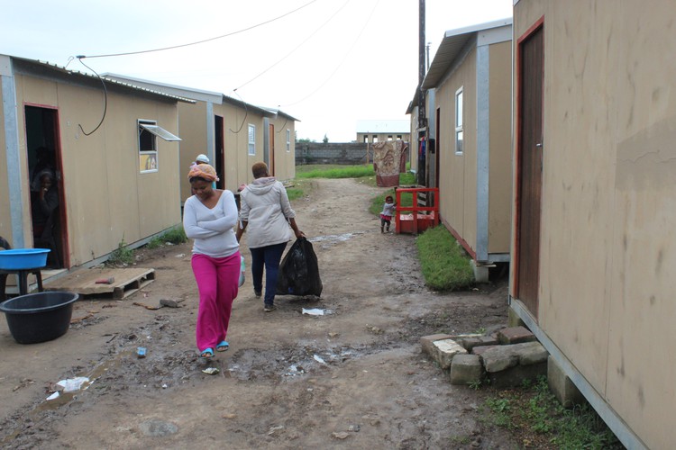 Photo of a lane between prefab houses