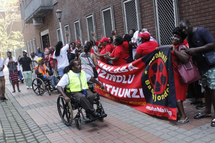 Photo of people outside court