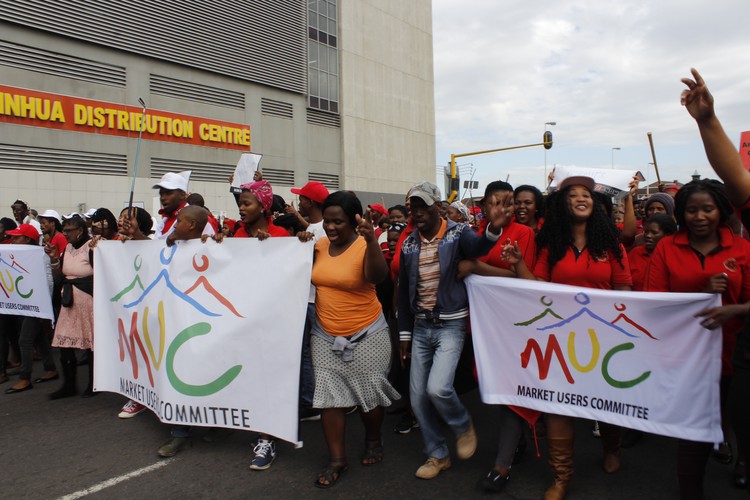 Photo of traders marching.