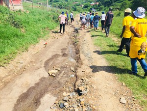 Photo of pothole riddled road