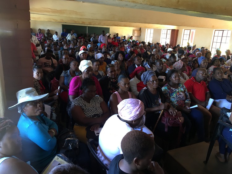 Photo of people sitting in meeting