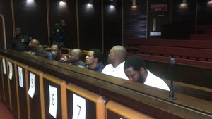 Photo of men in court