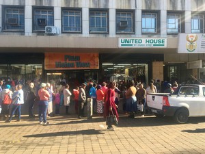 Photo of queues outside a building