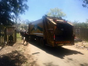 photo of a rubbish truck