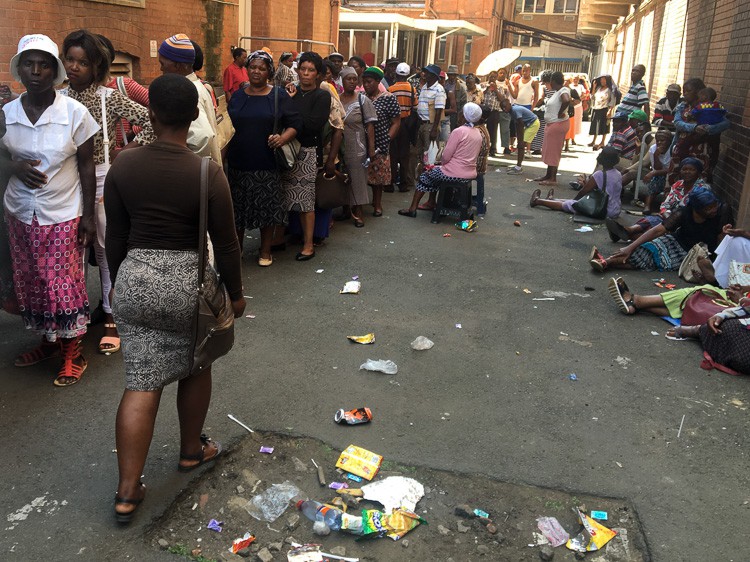 Photo of long grant recipient queues